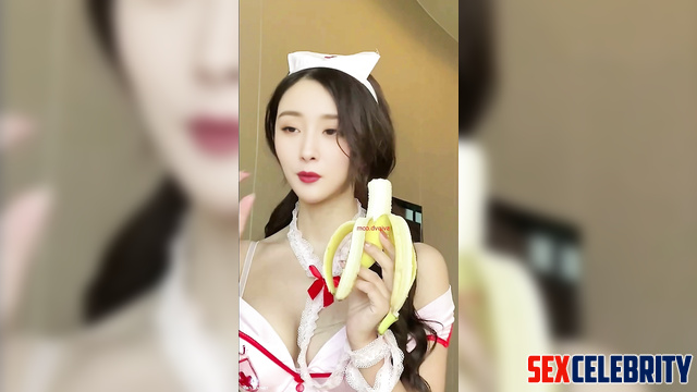 Chinese Yang Mi (中国人杨幂) as a nurse eats a banana 护士吃香蕉 [PREMIUM]